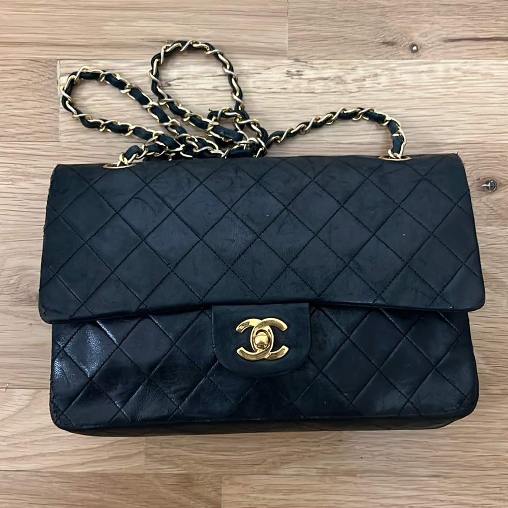 Vintage Medium Black Chanel Double Flap Lambskin. Gold hardware.